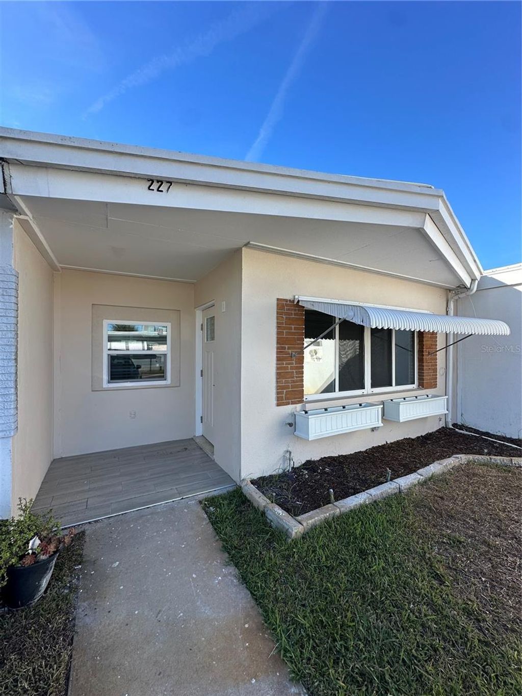 Photo of 250 Rosery Road NW #227, Largo, FL 33770 (MLS # TB8425501)