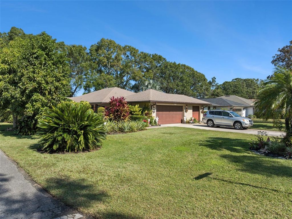 Photo of 35 Pipers Pass, Haines City, FL 33844 (MLS # O6361265)