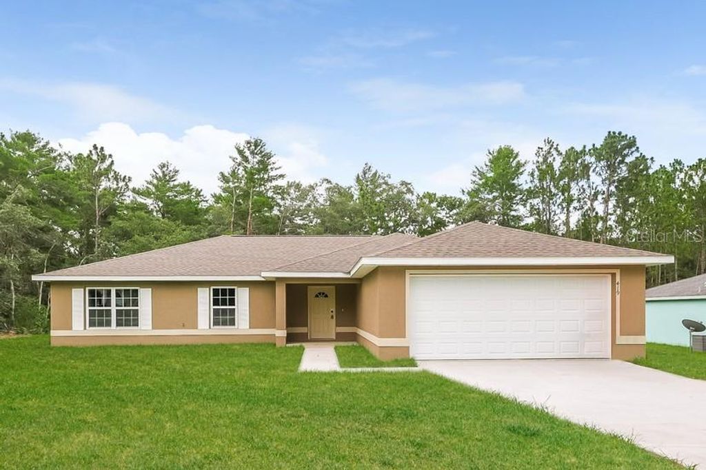 Photo of 419 Marion Oaks Pass, Ocala, FL 34473 (MLS # O6373340)
