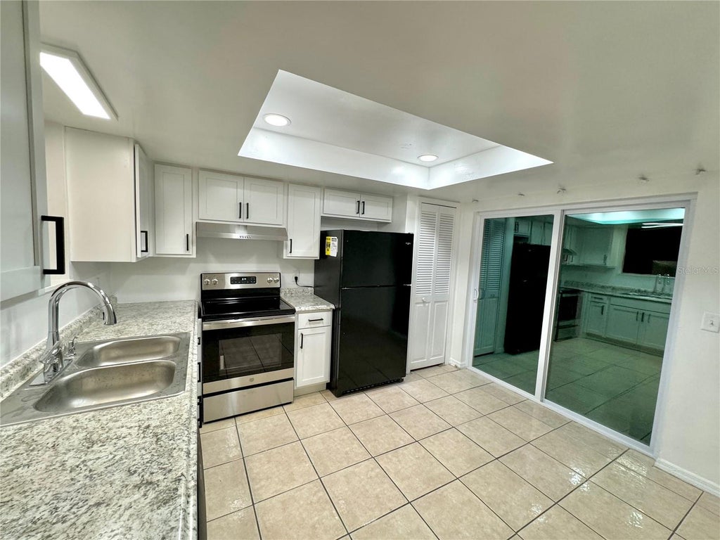 Photo of 12028 Tift Circle, Orlando, FL 32826 (MLS # O6449888)