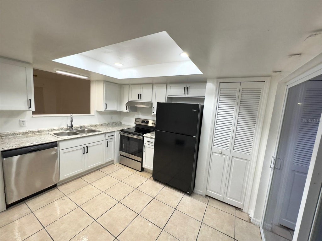 Photo of 12028 Tift Circle, Orlando, FL 32826 (MLS # O6449888)
