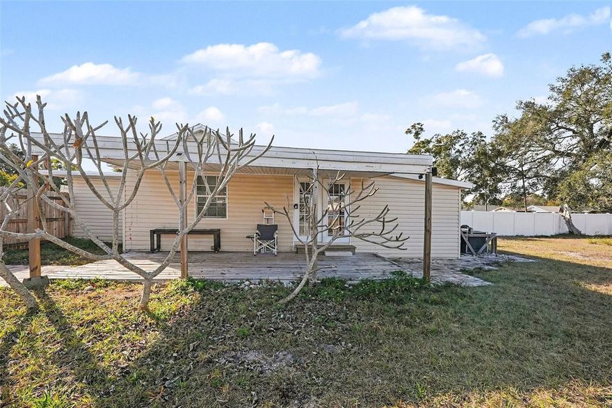If you are looking for Function, Comfort & Potential, you are going to love this home located on the Clearwater/Largo line, offering an incredible opportunity to own a property with ENDLESS POSSIBILITIES! The home has been modestly updated and features a functional layout with inviting living spaces, a spacious kitchen with warm cabinetry, STAINLESS STEEL APPLIANCES, ample counter space, and an in-kitchen dining area. The carpeted living room and bedrooms add warmth and comfort, creating a cozy and welcoming atmosphere throughout the home. All three bedrooms are generously sized, providing flexibility for a variety of lifestyles. The third bedroom is currently being used as a home office, making this home an excellent option for work-from-home professionals, entrepreneurs, or anyone needing a dedicated FLEX SPACE without sacrificing bedroom count. The bathroom has been beautifully updated, featuring modern finishes and a TUB/SHOWER COMBINATION, offering both style and functionality. Step outside and you’ll immediately appreciate the LARGE LOT this home sits on, a rare find in this area, with plenty of room to PARK YOUR RV, BOAT OR EXTRA VEHICLES. There is also ample space to add an ADU/MOTHER-IN-LAW SUITE, making this property ideal for INCOME POTENTIAL, a guest house, or MULTI-GENERATIONAL LIVING, the possibilities are endless! With a few updates & thoughtful landscaping, this property will truly shine. The backyard can offer privacy, room to expand, and space to create your own outdoor oasis — perfect for entertaining, gardening, or future enhancements. A covered porch adds additional flexibility for outdoor living year-round. Conveniently located just 15 minutes from Clearwater Beach and Downtown Dunedin, you’ll enjoy easy access to dining, shopping, breweries, and entertainment. Daily conveniences such as shopping, restaurants, and grocery stores are just minutes away. For ease of travel, PIE Airport is approximately 20 minutes away and Tampa International Airport is about a 30-minute drive. This property is all about potential — whether you’re a buyer looking to personalize a space, a work-from-home buyer seeking flexibility, or an investor focused on value and future expansion, this home, and the land it sits, on offer unlimited possibilities in a prime Clearwater/Largo location.