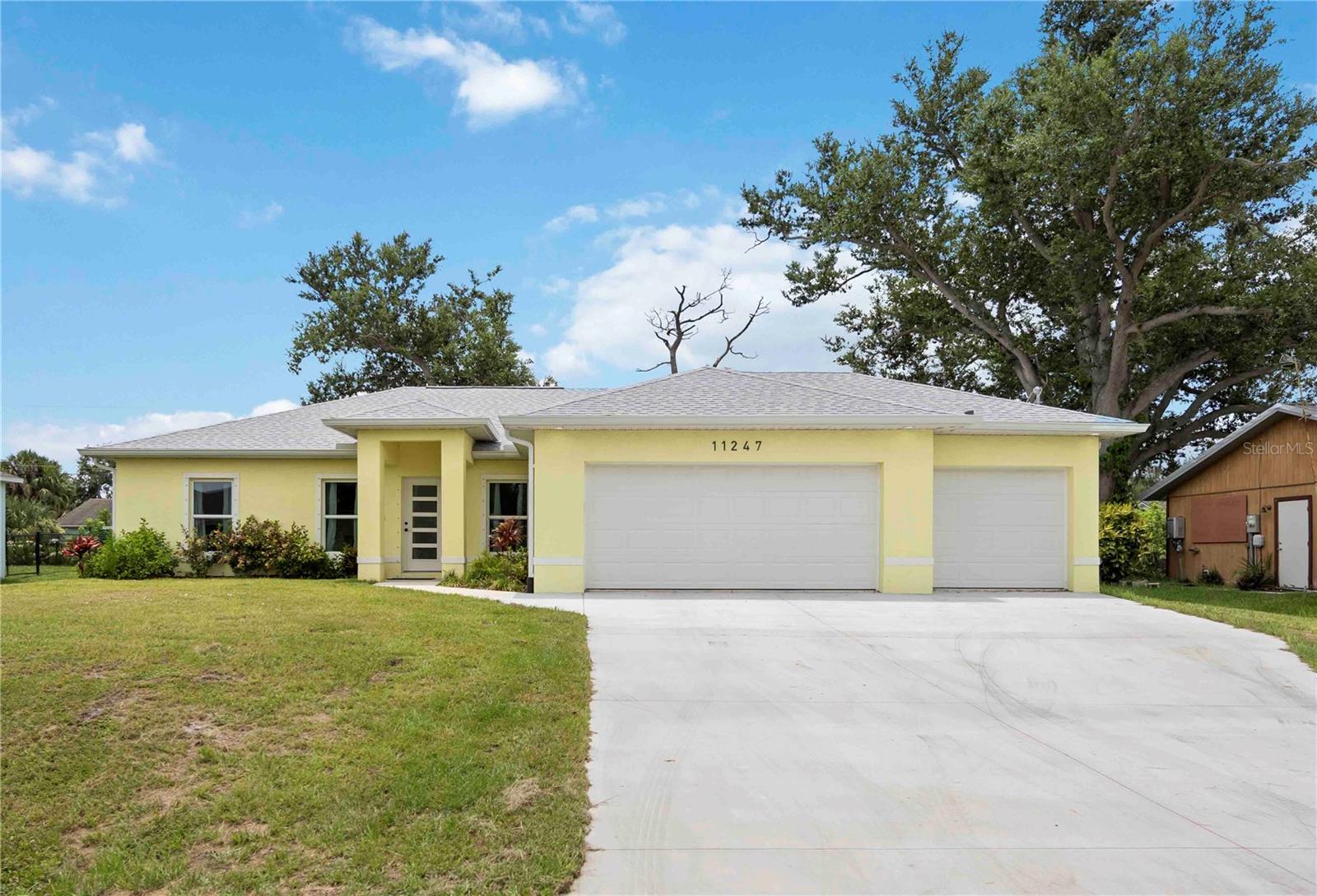 Under contract-accepting backup offers. LIKE NEW and CUSTOM-BUILT in 2023, this 3-bedroom, 2-bathroom home with a 3-CAR GARAGE offers the perfect blend of modern design, comfort, and thoughtful craftsmanship. Nestled in a great neighborhood just minutes from Englewood Beach!***This home is located in a NO FLOOD ZONE with NO HOA and is connected to PUBLIC WATER, giving you both peace of mind and the freedom to enjoy your property your way.***
Step inside to an open, split-bedroom floor plan with VAULTED CEILINGS and high-end finishes that stand out from typical cookie-cutter new builds. The spacious kitchen is beautifully appointed with all-wood cabinetry, porcelain tile flooring, and a large center island with a built-in sink, flowing effortlessly into the living and dining spaces—perfect for entertaining.
The luxurious master suite features a spa-like bathroom with a deep soaking tub and dual vanities. Two additional bedrooms are located on the opposite side of the home, providing comfort and privacy for family or guests.
Enjoy Florida living on the large covered lanai that overlooks the expansive, private backyard—ideal for relaxing or hosting gatherings. Located just minutes from top-rated schools, shopping, and a variety of excellent restaurants, this home truly offers the best of convenience and lifestyle.
With its prime location, custom upgrades, and smart layout, this home checks all the boxes. Don’t miss the opportunity to make it yours!