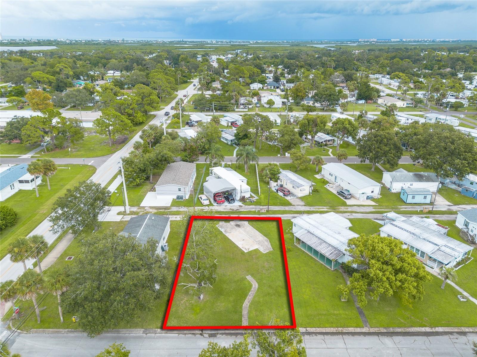 Build your future on this ready-to-go mobile home lot! This cleared property has everything in place for a smooth installation, with plumbing and electrical already plumbed on-site and ready to be hooked up. Impact fees have been paid, and a current survey is available, saving you time and money in the setup process. A concrete driveway pad has already been poured, providing a solid start for your new home. Contact the city directly for exact details on permitted uses and installation requirements. This is a prime opportunity to move forward quickly and make your vision a reality!
