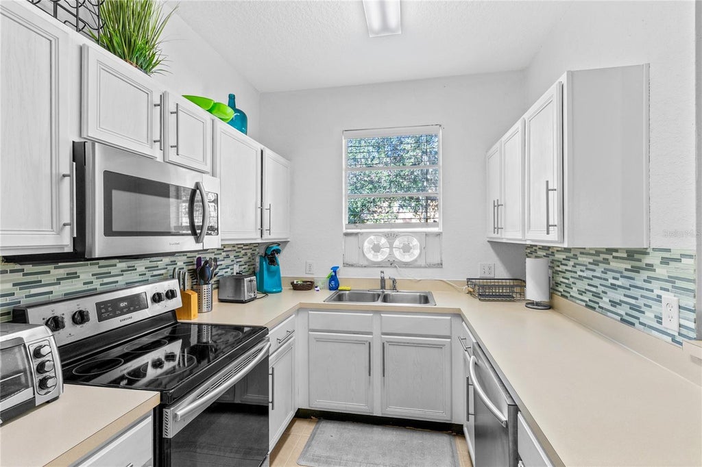 Photo of 121 Palermo Street, Davenport, FL 33897 (MLS # O6444782)