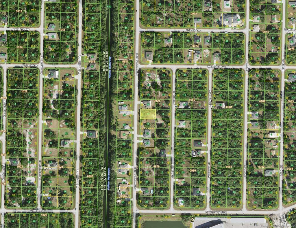 Photo of 430 Ravenswood Boulevard, Port Charlotte, FL 33954 (MLS # C7529833)
