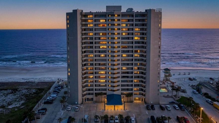 Perched on the 17th floor in the highly sought-after south end of Daytona Beach Shores, this rare direct oceanfront condo offers panoramic Atlantic Ocean views, luxury finishes, and true move-in ready convenience in the heart of the World's Most Famous Beach. This spacious 3-bedroom, 3-bathroom oceanfront residence is ideal for a primary home, second home, or income-producing investment property. Designed to maximize natural light and breathtaking coastal views, the living space features a beautifully enclosed glass lanai with an open-concept redesign--perfect for enjoying sunrise views over the ocean year-round. The seamless layout flows into a chef's kitchen with granite countertops, ample cabinetry, and generous space for entertaining or everyday living.

This unique unit stands out with custom mural artwork adding character and sophistication throughout, while Berber carpeted bedrooms create comfortable, private retreats. Custom California-style closets provide enhanced storage and organization, blending style with functionality.

Offered fully furnished, this condo is truly turnkey and ready for immediate occupancy or rental use. Whether you're searching for a Daytona Beach oceanfront condo, a vacation home by the beach, or a coastal investment opportunity, this one-of-a-kind residence delivers the ultimate Florida lifestyle with unmatched views and location.