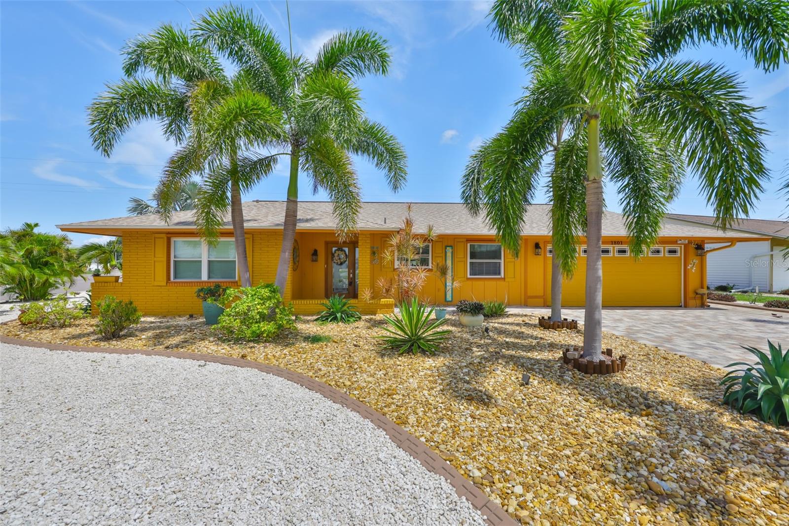 Welcome home! This beautiful FULLY FURNISHED updated two-bedroom, two-bathroom, two-car garage single-family home is located on a 9,300 sq ft large corner lot. Home is located in a NON-HOA neighborhood. ROOF replaced May 2021 including soffits, fascia, gutters and downspouts. New washer and newer dryer convey also.
Beautifully updated modern kitchen features granite countertops, stainless steel appliances, a built-in oven and microwave, soft-close cabinets and drawers, deep double sinks, and a tile backsplash. The open floor plan includes ceramic wood-like tile throughout the entire home. The kitchen and dining area are accented with pendant lights, chandeliers, and crown molding. There is a large eat at kitchen bar area with granite counter.
The primary bathroom has been beautifully updated with white tile, quartz countertops, and a walk-in shower. The primary bedroom also includes a spacious walk-in closet.
Large utility room has a new washer (2025) and newer dryer. Utility room includes shelving and large space for additional storage.
Enjoy the large, screened-in back patio, complete with a ceiling fan, roller shades and tile flooring. The mature landscaping boasts palm trees and a xeriscaped yard with poured curbing on almost a 1/4 acre lot. Silver yucca trees in the backyard add character to a backyard oasis.
From the large yard with beautiful mature landscaping, pavered driveway and walkways, to the beautifully updated interior, this home is ready to be enjoyed in a wonderful 55+ golf cart community. Home is located close to all Sun City Center community ammenities as well as shopping, medical facilities and I-75. Convenient access to Tampa International Airport as well as the opportunity to see several professional sports teams and the beaches in Sarasota and more! Sun City Center Community Association membership is required for a small yearly fee but there is no other HOA for this home.