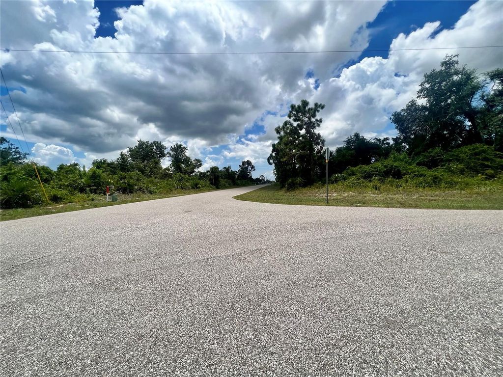 Photo of 12224 Vaughan Avenue, Port Charlotte, FL 33981 (MLS # C7495285)