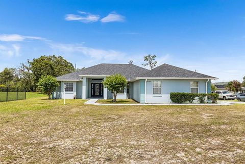 Photo of 10360 SW 48th Avenue, Ocala, FL 34476 (MLS # OM716147)