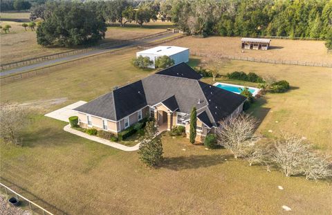 Photo of 9032 NW 30th Avenue, Ocala, FL 34475 (MLS # OM716526)