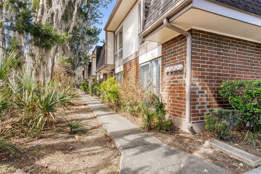 Fully furnished 2nd floor 1 bedroom/1 bathroom condo in Summit House right across from Shands and the VA! Currently operating as a successful Airbnb, it’s ready to keep generating income from day one.  If looking to make it your own, this one is completely turnkey. This condo checks all the boxes- location, character, and proven income. In 2024, the property averaged $2,106 per month in gross Airbnb income, and in 2025 the average increased to $2,382 per month. Inside, you’ll find standout features you won’t see in most condos in the neighborhood, including an exposed brick wall in the primary bedroom, laminate flooring, granite countertops, and stainless steel appliances. The HOA adds exceptional value by covering pest control, hazard insurance, and water, a community laundry room, and pool.  Whether you’re an investor looking for a proven short-term rental, a medical professional seeking a convenient place to live, or someone wanting a low-maintenance home in a prime Gainesville location, come see why this one is perfect for you. Need to be close to UF? This one is situated on a bus route with direct access to UF campus and other areas of Gainesville. Call to set up your showing today!