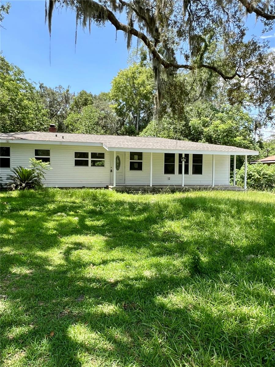 Charming Fully Remodeled Home Across from a Park – Ideal for First-Time Buyers!
Welcome to your beautifully renovated 3-bedroom, 2-bathroom home located on a quiet street in the heart of Ocala. Perfectly suited for first-time homeowners or young families, this move-in-ready gem offers modern updates, a prime location, and everyday comfort.
Step onto the large, covered front porch and take in peaceful views of the park directly across the street—a serene spot to relax with your morning coffee. Inside, you’ll find a bright, open living area featuring a cozy fireplace that flows seamlessly into the dining area and updated kitchen. The kitchen is fully equipped with a front-facing sink, dishwasher, range, microwave, and refrigerator.
Both bathrooms have been fully remodeled with stylish finishes and upgraded lighting mirrors. The primary suite includes a private bathroom with a walk-in shower, while the guest bathroom offers a tub and shower combo. Throughout the home, enjoy the durability and beauty of brand-new vinyl plank flooring, as well as all-new windows and doors.
Outside, the spacious fenced backyard features an in-ground pool (currently not operational) that’s secured with a safety cover—offering exciting potential for future enjoyment. The laundry room is conveniently located indoors for added ease.
Located just minutes from downtown Ocala, top-rated schools, hospitals, grocery stores, and local dining, this home combines convenience, charm, and modern living. Home includes Navien Gas Tankless Water Heater, New Windows throughout. Roof (2024)
Don’t miss the opportunity to make this your first home—schedule your showing today!