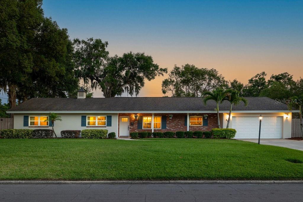 Welcome to this stunning Maitland residence, nestled in a highly coveted neighborhood. From the moment you step inside, you'll be greeted by a feeling of warmth and hospitality. The meticulous attention to detail and impeccable design choices create an atmosphere that is inviting.
This home boasts three spacious bedrooms and two and a half baths, offering ample room for comfortable living. The open floor plan, adorned with gorgeous travertine tile and elegant wood flooring, sets the stage for seamless entertaining and gatherings. Large sliding doors and windows flood the living spaces with natural light, seamlessly connecting the indoors with the beautiful outdoors.
The family room is a cozy retreat, complete with a wood-burning fireplace that adds charm and character. From here, you can enjoy picturesque views of the backyard oasis, a true haven of tranquility. The meticulously landscaped yard features a sparkling pool, surrounded by newly installed pavers, creating a serene and elegant outdoor space. The freshly painted exterior and new fence enhance both privacy and curb appeal. The addition of new doors at the front, Florida room, and garage adds a touch of sophistication to the overall aesthetic. Plantation shutters throughout the home add a touch of elegance.
The kitchen is a dream for any chef, featuring custom cabinetry, granite countertops, and stainless steel appliances. The convenient center island adds functionality and style to this culinary masterpiece. Whether you're hosting a grand dinner party or enjoying a casual meal at the breakfast bar, this kitchen is sure to impress.
Retreat to the master suite, a sanctuary of comfort.. The newly renovated private bathroom exudes elegance and provides a tranquil escape. With two walk-in closets and additional hall closets throughout the home, storage is never a concern.
Situated on a generous lot, this traditional home showcases solid construction and is surrounded by beautifully renovated and newly constructed properties. The seamless flow from the formal living and dining areas to the kitchen and family room allows for easy movement and effortless entertaining. The garage features a spacious laundry room complete with storage cabinets, a sink, and a convenient water closet.
This remarkable home offers the opportunity to live in a serene and desirable Maitland neighborhood. Its close proximity to Winter Park provides easy access to a plethora of shopping and dining options, further enhancing the convenience and desirability of this location.
Don't miss out on the chance to own this exceptional luxury home, where elegance, comfort, and tranquility come together in perfect harmony. It's a true gem waiting for you to make it your own.