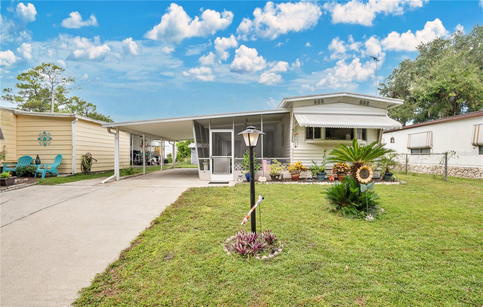Welcome to Leisure World Park! This charming 2-bedroom, 1-bathroom mobile home offers comfort, convenience, and a touch of Florida lifestyle living.
As you arrive, you’ll notice the carport and spacious screened wrap-around patio, perfect for enjoying morning coffee or evening breezes. Step inside to find wood flooring throughout, a cozy kitchen with an eat-in space, solid wood cabinets, stainless steel appliances, and a white refrigerator framed by windows with a pleasant view. The home features two comfortable bedrooms and a full bath.
The screened patio leads to an extra storage area with washer/dryer hookups and built-in shelving—a great space for organization.
Leisure World Park is a gated, waterfront community offering exclusive amenities including a private boat ramp, marina, and community pool. With direct access to the St. John’s River and Lake Monroe, this is a boater’s and nature lover’s dream. Conveniently located just minutes from shopping, dining, and entertainment, this home provides the perfect blend of relaxation and accessibility.
Don’t miss your chance to own a piece of this vibrant waterfront community—schedule your showing today!