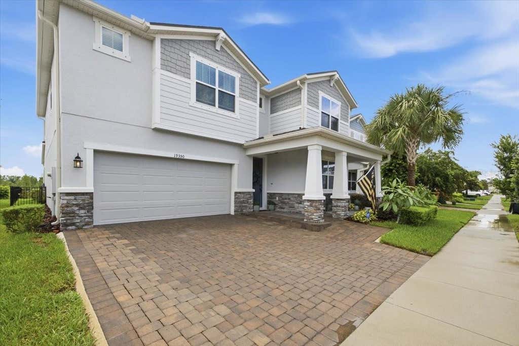 Photo of 19350 Blue Pond Drive, Lutz, FL 33558 (MLS # TB8536406)