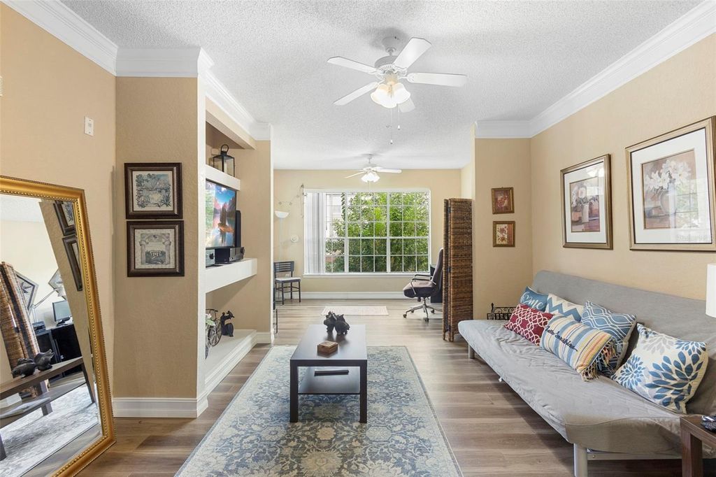 Photo of 13016 Plantation Park Circle #1124, Orlando, FL 32821 (MLS # O6348027)
