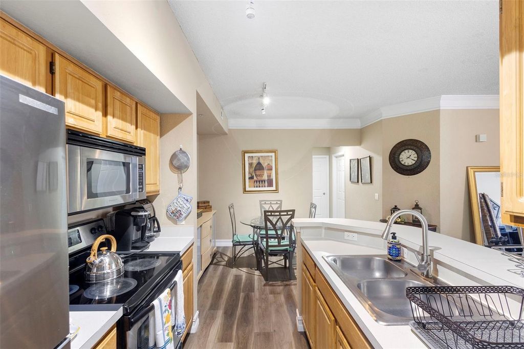 Photo of 13016 Plantation Park Circle #1124, Orlando, FL 32821 (MLS # O6348027)