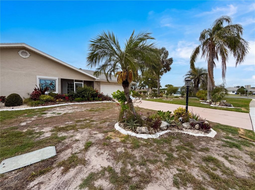 Photo of 1838 N Pebble Beach Boulevard, Sun City Center, FL 33573 (MLS # O6413701)