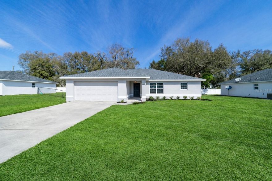 New Landscaping on it's way! This home is a highly desirable floor plan with a 24 Foot Lanai!  
Look what's Brand New****Roof, Windows, Cabinets, Lighting, Plumbing Fixtures, Flooring, Trim, Appliances and Window Blinds to name a few****COMPLETELY RENOVATED!****
Double walk-in closets and dual vanities in Primary suite.