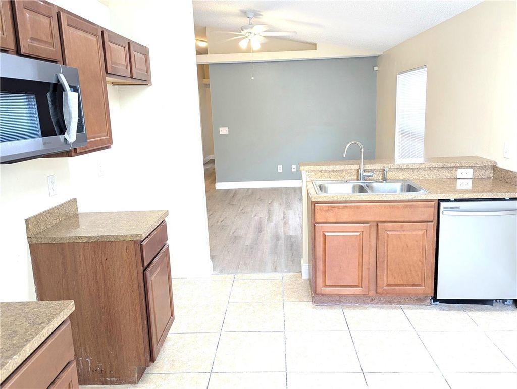 Photo of 191 Dahlia Village Circle #GE, Orlando, FL 32807 (MLS # O6352628)