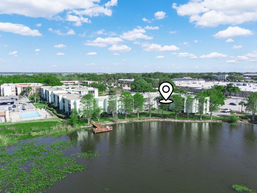 Enjoy this Lake Front condo in a wonderful 55+ community.  Welcome to Lakeside Village with this updated condo with an incredible water view overlooking peaceful lake Parker.  This condo features a spacious floor plan, updated kitchen with nice stainless steel appliances, inside laundry room, updated bathroom with walk in shower in one bath and tub-shower combo in the other bathroom.   Unwind on the enclosed screen lanai while you enjoy sunset views over Lake Parker. The primary bedroom has a large walk in closet and doors open to the lanai.  HOA dues cover exterior maintenance, water, sewer, cable TV, internet, pool, tennis court, fishing dock and sauna by the pool.