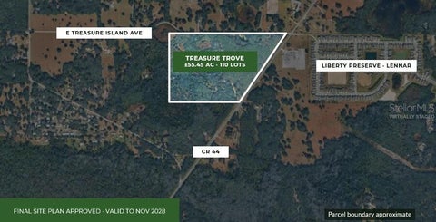 Photo of 9300 E Treasure Island Avenue, Leesburg, FL 34788 (MLS # O6453662)
