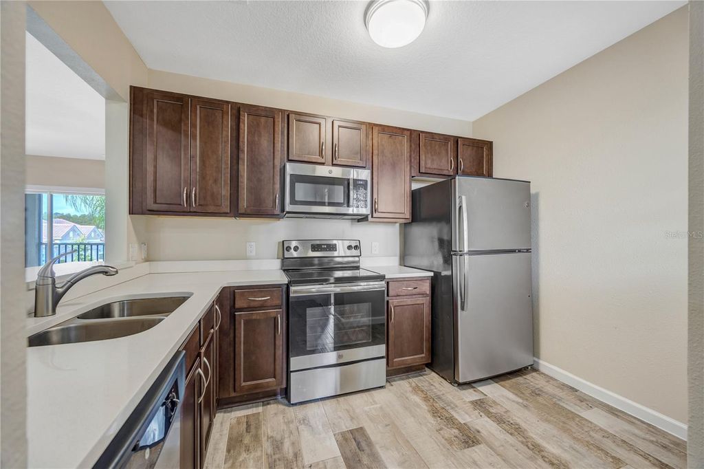 Photo of 1231 Godavari Way #203, Wesley Chapel, FL 33543 (MLS # TB8513471)