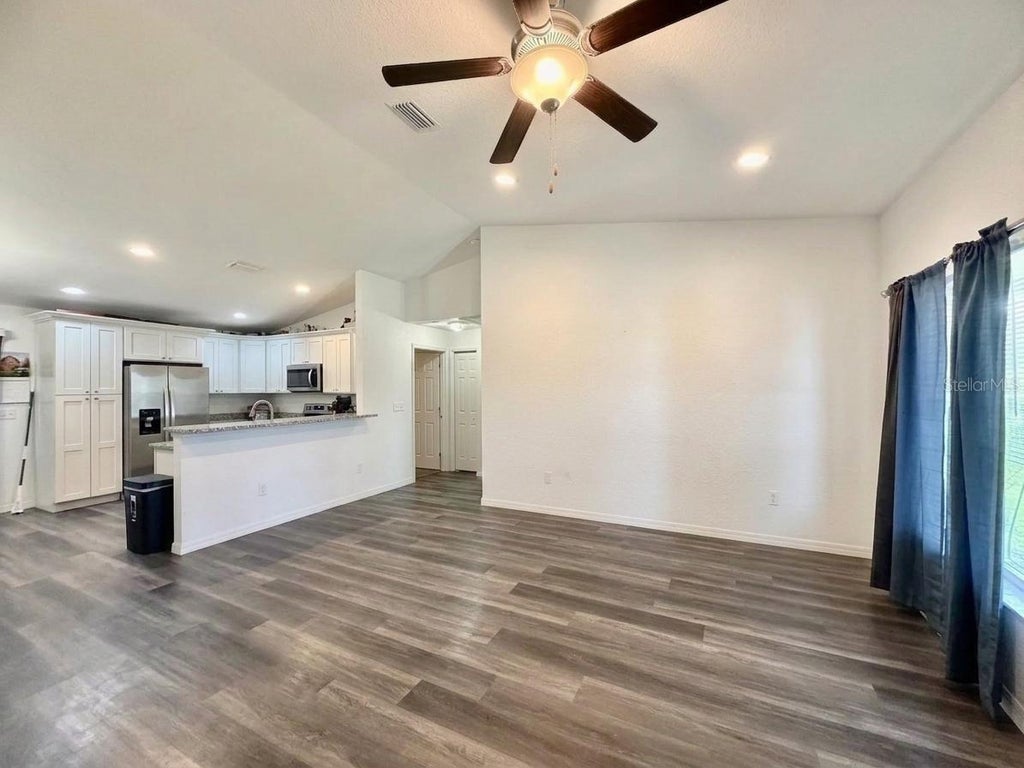 Photo of 48 Maple Drive, Ocklawaha, FL 32179 (MLS # OM730627)