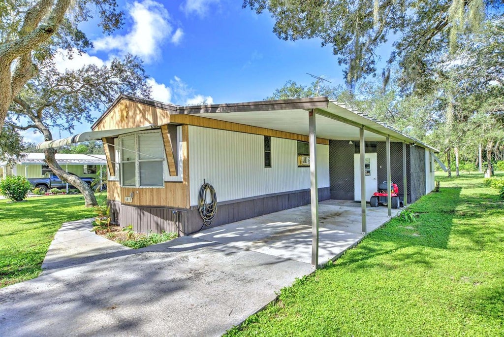 Photo of 6413 Old Orchard Avenue, Sebring, FL 33876 (MLS # C7531000)