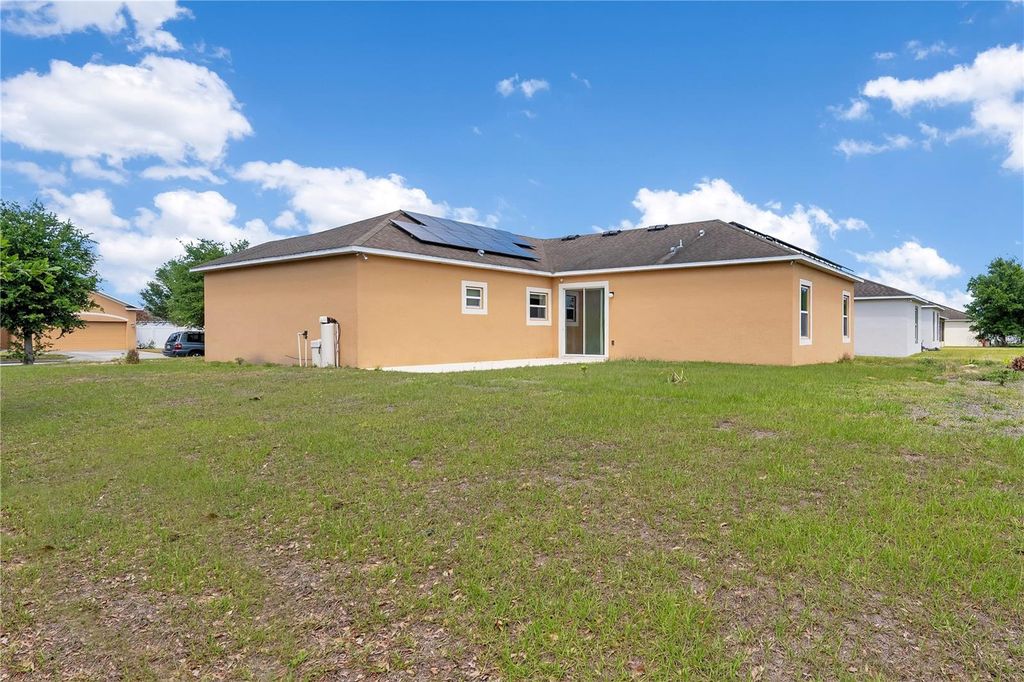 Photo of 318 Gladesdale Street, Haines City, FL 33844 (MLS # S5147965)