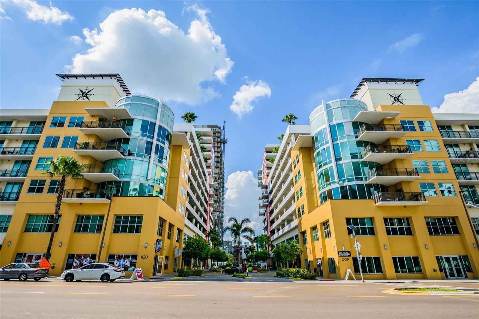 Stunning Corner Unit in the Heart of Tampa's Channel District! Experience urban living at its finest in this 2-bedroom, 2-bathroom 1,229SF condo on the 11th floor of Grand Central. Enjoy entertaining in your spacious living area with FLOOR-TO-CEILING wraparound windows that fill the space with natural light and offer breathtaking city views with a partial channel view. The modern kitchen boasts Viking stainless steel gas appliances, an island with a sink, and a breakfast bar. Sleek tile flooring throughout enhances the contemporary feel. Grand Central is a secured community with resort-style amenities, including Clubhouse, well equipped fitness center, two pools with hot tubs, spa, dog park, outdoor grills, green space, and concierge. Step outside to a vibrant mix of retail shops, restaurants, massage studio, Crunch Fitness, dry cleaner, coffee shops and bars, Publix and CVS. This unit includes two assigned parking spaces, fresh paint, and a new dryer. HOA fees cover internet, cable, water, sewer, trash, hot water, gas, and more! Just minutes from a stroll along the Riverwalk, Amalie Arena, Ybor City, Sparkman Wharf, Publix, shopping, Stageworks Theatre and all the luxury and convenience Downtown Tampa has to offer. Don’t miss this incredible opportunity—schedule a showing today!