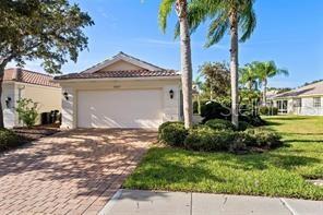 One or more photo(s) has been virtually staged. One or more photos has been virtually staged. This 2 bedroom villa is located in the award winning lifestyle gated community of VillageWalk on Palmer Ranch. The villa's great room plan has 2 bedroom suites and a 2 car garage. Community amenities include Towncenter with meeting/party rooms, lending library, state of the art fitness center, a lagoon and lap pool, 6 har-tru tennis courts, pickle ball courts, a gift shop, restaurant, gas station and miles of walking trails.