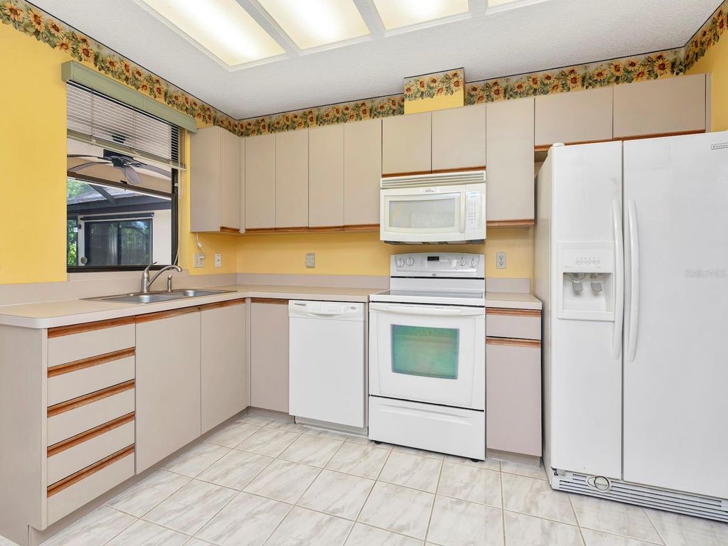 Photo of 1955 Sandalwood Place, Clearwater, FL 33760 (MLS # TB8487407)