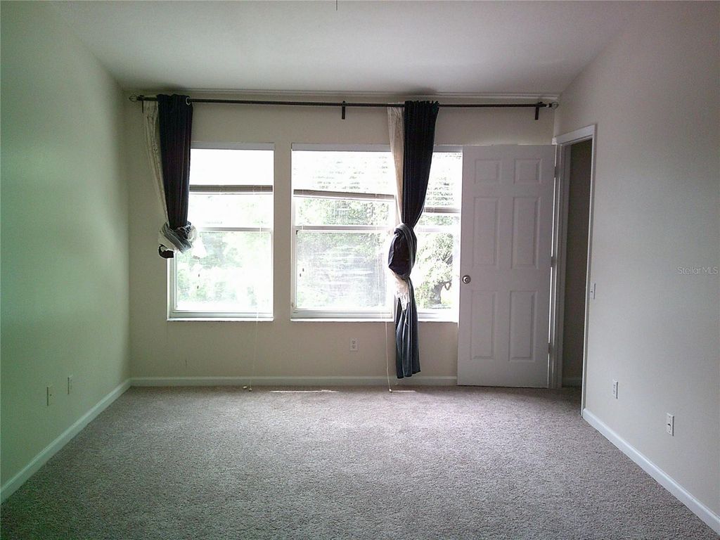 Photo of 6292 Twain Street #107, Orlando, FL 32835 (MLS # O6398367)