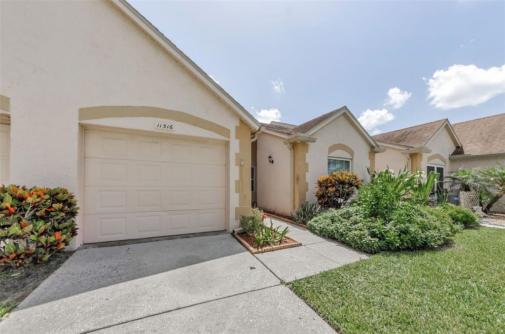Photo of 11516 Versailles Lane, Port Richey, FL 34668 (MLS # W7877499)