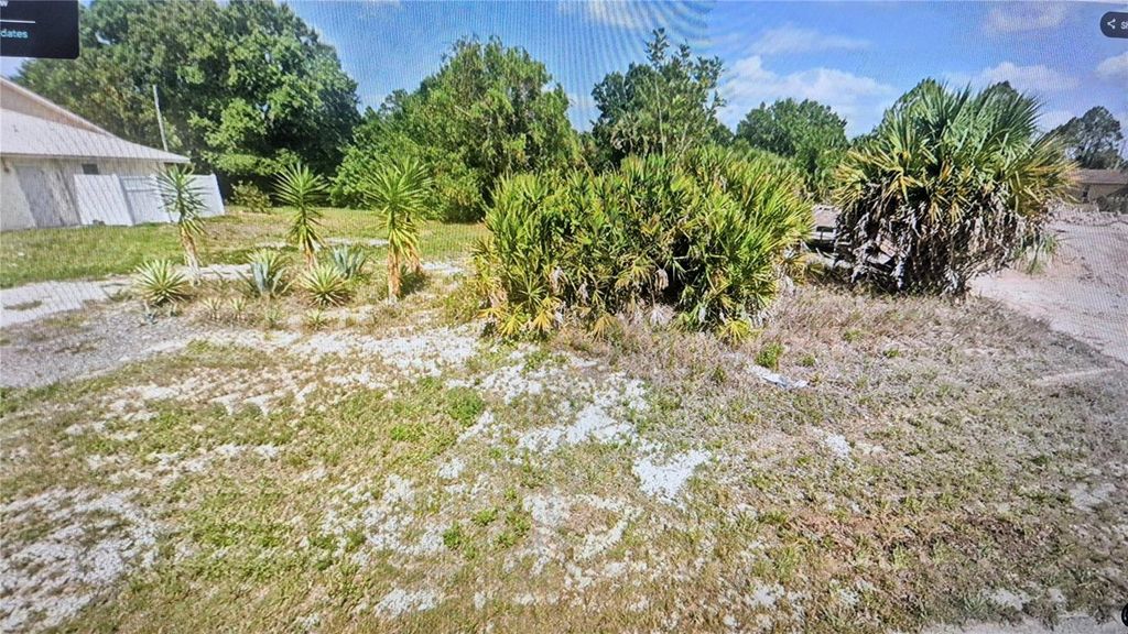Photo of 521 Harry Thayer Avenue S, Lehigh Acres, FL 33974 (MLS # O6387665)
