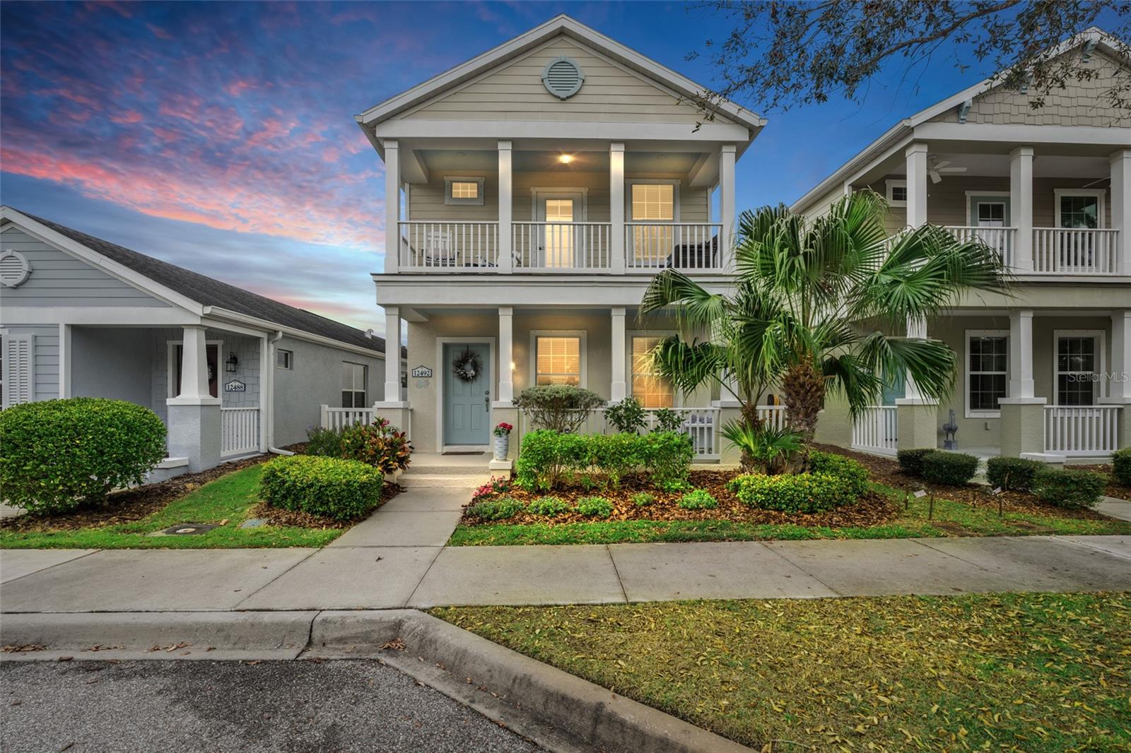 PRICE IMPROVEMENT! Located in the highly sought-after Grand Palm community, this stunning two-story home offers a perfect blend of modern elegance and resort-style living. Featuring three spacious bedrooms and two and a half bathrooms, this meticulously designed residence provides both comfort and functionality. The open-concept layout is ideal for entertaining, with a bright and airy living space flowing seamlessly into the gourmet kitchen, complete with sleek countertops, stainless steel appliances, and a generous island. Upstairs, the primary suite serves as a private retreat, boasting a spa-like ensuite bath and a spacious walk-in closet. Two additional bedrooms offer flexibility for family, guests, or a home office. A charming balcony provides a serene outdoor escape, perfect for morning coffee or unwinding in the evening breeze. Beyond the home, Grand Palm offers an unparalleled lifestyle with resort-style amenities at your fingertips. Take a dip in the lagoon-style pool, complete with a waterslide and splash pad, or relax in the jacuzzi. Sports enthusiasts will enjoy the pickleball, bocce ball, tennis, volleyball, and basketball courts. For pet owners, two dedicated dog parks cater to both large and small breeds. Conveniently located between U.S. 41 and I-75, this home offers easy access to stunning Gulf Coast beaches, top-rated dining, shopping, and entertainment. Experience the best of Florida living in this exceptional home!