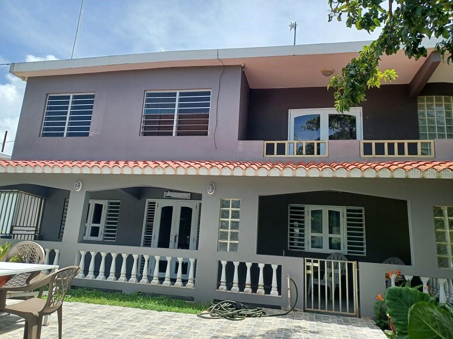 This beautiful 3 bedroom, 2 bathroom home in Villa Borinquen is paradise. In a quiet neighborhood, private, with a completely fenced yard. The yard is tastefully landscaped with a patio and a covered balcony. Not only this, but there is a gazebo as well next to the pool, for barbequing, and relaxing. Off street, gated parking with a large detached storage area.
Stepping through the front door you will find a spacious, open living area. Living room, dining and kitchen flow together with arched doorways and windows to complete the ambience. AC throughout. One bathroom downstairs and one up. A spiral staircase leads upstairs to the three bedrooms. There is an extra small balcony off of the foyer on the second level where you can catch the breezes and enjoy the view. Beautifully furnished, and furnishings are negotiable. Well maintained inside and out! This approx. 2,000 squarefoot remarkable concrete 3 BR/2 BATH single-family residential property on approximately 1/3 of an acre is Titled and is zoned for Residential Use.
With mid island convenience you can access the north or south sides of Vieques in no time at all. Start living your dream today!!