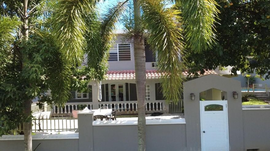 This beautiful 3 bedroom, 2 bathroom home in Villa Borinquen is paradise. In a quiet neighborhood, private, with a completely fenced yard. The yard is tastefully landscaped with a patio and a covered balcony. Not only this, but there is a gazebo as well next to the pool, for barbequing, and relaxing. Off street, gated parking with a large detached storage area.

Stepping through the front door you will find a spacious, open living area. Living room, dining and kitchen flow together with arched doorways and windows to complete the ambience. AC throughout. One bathroom downstairs and one up. A spiral staircase leads upstairs to the three bedrooms. There is an extra small balcony off of the foyer on the second level where you can catch the breezes and enjoy the view. Beautifully furnished, and furnishings are negotiable. Well maintained inside and out! This approx. 2,000 squarefoot remarkable concrete 3 BR/2 BATH single-family residential property on approximately 1/3 of an acre is Titled and is zoned for Residential Use.


With mid island convenience you can access the north or south sides  of Vieques in no time at all. Start living your dream today!!