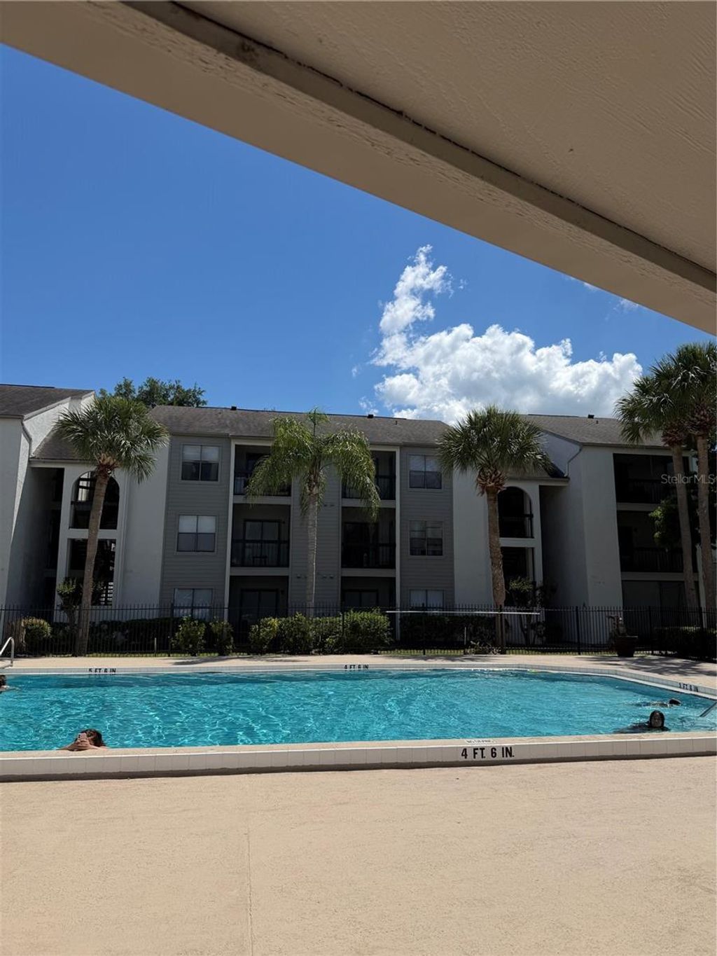 Photo of 2130 Cascades Boulevard # 101, Kissimmee, FL 34741 (MLS # O6400900)