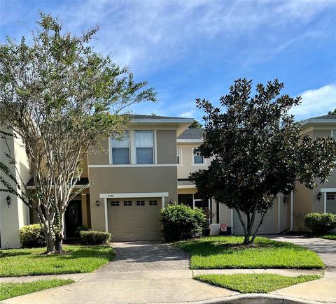 Photo of 9958 Tivoli Villa Drive, Orlando, FL 32829 (MLS # O6347224)
