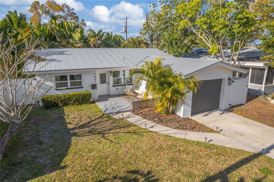 Beautifully renovated block home in the popular Shore Acres neighborhood. Completely renovated in 2025, offering modern updates and a lush tropical backyard retreat. This move-in ready home combines style, durability, and thoughtful upgrades throughout. Inside, you’ll find wood-look tile flooring, impact windows, and a bright open living space anchored by an electric fireplace that creates a warm focal point. The updated kitchen features quartz countertops, an apron-front farmhouse sink, stainless steel appliances, and a gas range. Major improvements provide peace of mind, including a 2018 metal roof, impact windows, and a gas tankless water heater for endless hot water. Step outside to the elaborately landscaped tropical backyard, a private oasis designed for relaxing and entertaining. Mature palms, lush plantings, and thoughtfully designed outdoor spaces create the perfect Florida lifestyle setting with plenty of space to add a pool. Located in a desirable Northeast St. Petersburg neighborhood, this home offers convenient access to downtown St. Pete, waterfront parks, dining, and shopping.