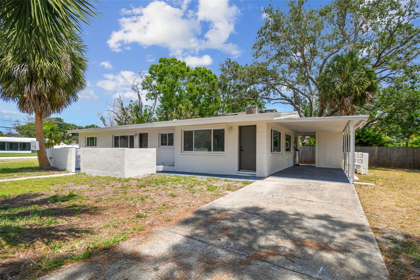 ASK ABOUT OUR RENT TO OWN OPTION TOO!
Fully refreshed and move-in ready, this solid block home combines quality construction with stylish upgrades throughout. Situated on a spacious corner lot just under a quarter acre, this rental features a newer roof (2024), new hot water heater, updated PGT hurricane-rated windows, and fresh interior and exterior paint.
Inside, you’ll enjoy a thoughtfully renovated layout with brand-new luxury vinyl plank flooring, shaker-style cabinets, sleek quartz countertops, updated lighting, and a beautifully remodeled bathroom. The third room is listed as a bedroom but offers flexibility as a bonus room, office, or flex space to suit your needs.
Step outside to a screened-in lanai—perfect for relaxing or entertaining—plus a generous yard and a deep driveway for ample parking.
Located in the vibrant coastal town of Tarpon Springs, you’ll be just minutes from the world-famous Sponge Docks, top-rated beaches, scenic parks, restaurants, breweries, and boutique shops. Enjoy easy access to fishing, boating, and waterfront recreation in a neighborhood that blends charm, convenience, and coastal living.
$100 Lease Prep Admin Fee Req. $60/Mo Resident Benefit Package Fee Required (Bi-Monthly A/C Filters, 4 On-Demand Alive Pest Control Treatments Available, & Renter's Insurance (you may also choose your own provider)) See Agent for Full Details
3 Year Lease, Rent to Own also available with $50,000 Down Payment - See Agent for Full Terms