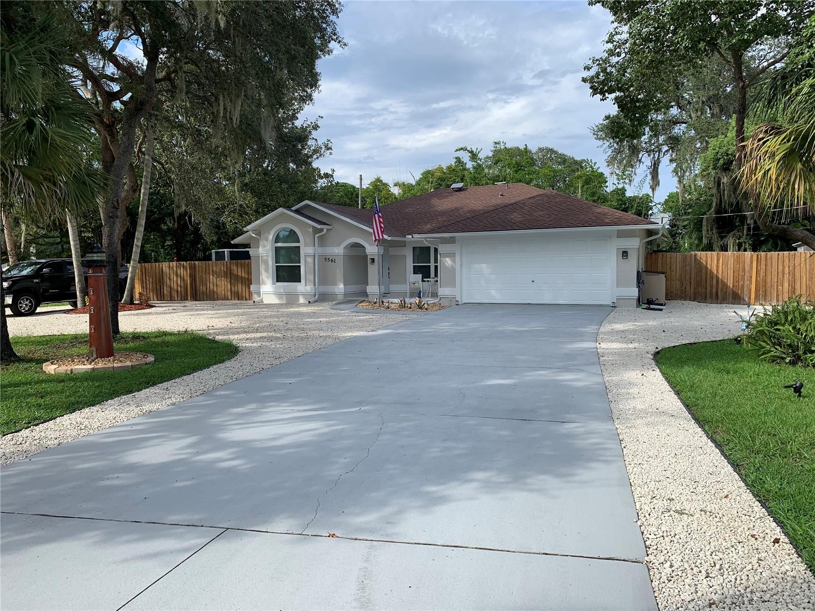 Solid bones. Zero flooding. This 4-bedroom, 2-bath home in Port Orange is the definition of move-in ready with room to make it your own. Featuring a 2019 roof, 2022 new window and doors, new water heater 2023. Smart split floor plan, and no history of flooding, this house gives you peace of mind from day one. Inside, the layout flows beautifully with natural light pouring in. The kitchen is functional with a 2022 granite countertop and connected to the main living spaces, offering the perfect setup for everyday living or casual entertaining. The primary suite is spacious and private with a large walk in closet and with two additional bedrooms that are just the right size. Big and full of daylight Florida room with sliding door. Outside a new huge concrete patio. A lot of fruit trees in backyard and front yard. Two storages with plenty of space for your tools. Big huge fenced side yard with plenty space for your toys: boat, RV trailer ... Also long circular drive way which is good for your guests or its a perfect place for Airbnb rental which a lot of parking space for you trailers or bikes.
You are minutes from everything Port Orange has. This is the kind of home you can comfortably live in today. Solid, serene, priced to sell and full of potential.