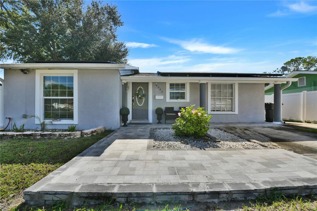Photo of 8845 Auburn Way, Tampa, FL 33615 (MLS # TB8546890)
