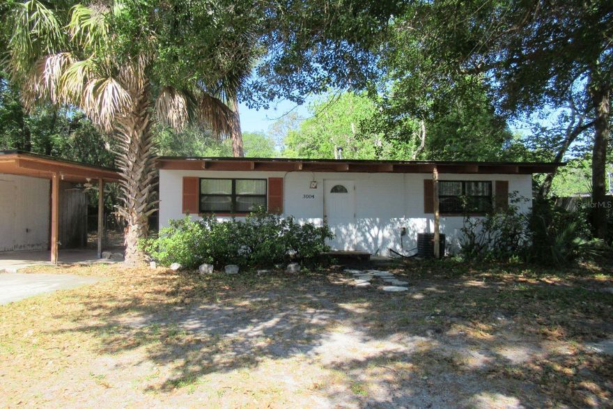 UNLOCK THE POTENTIAL!!!! PRICE TO BE A GREAT VALUE TO INVESTOR OR HOME OWNERS ON A BUDGET!!  This solid concrete block home is a blank canvas ready for your personal touch.  Featuring a newer HVAC system, and a almost new double door refrigerator.  The big ticket items are handled.  The carpets have been removed to save you demo costs.  Repair some rotten wooe, trim the plants, pick your flooring and paint ti trabsform this space to fit your needs. Home is situated near schools, shopping, and transit.  It's the prefect project for a savvy buyer.