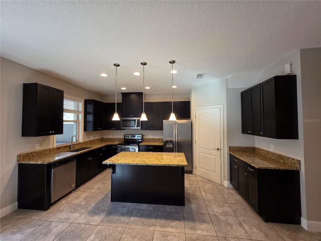 Photo of 14039 Helsby Street, Orlando, FL 32832 (MLS # O6380983)