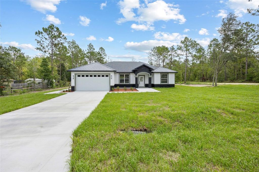 Photo of 9789 SW 125th Court Rd, Dunnellon, FL 34432 (MLS # OM704642)