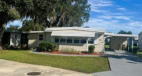 Photo of 103 Tamarisk Way, Leesburg, FL 34748 (MLS # R4909959)